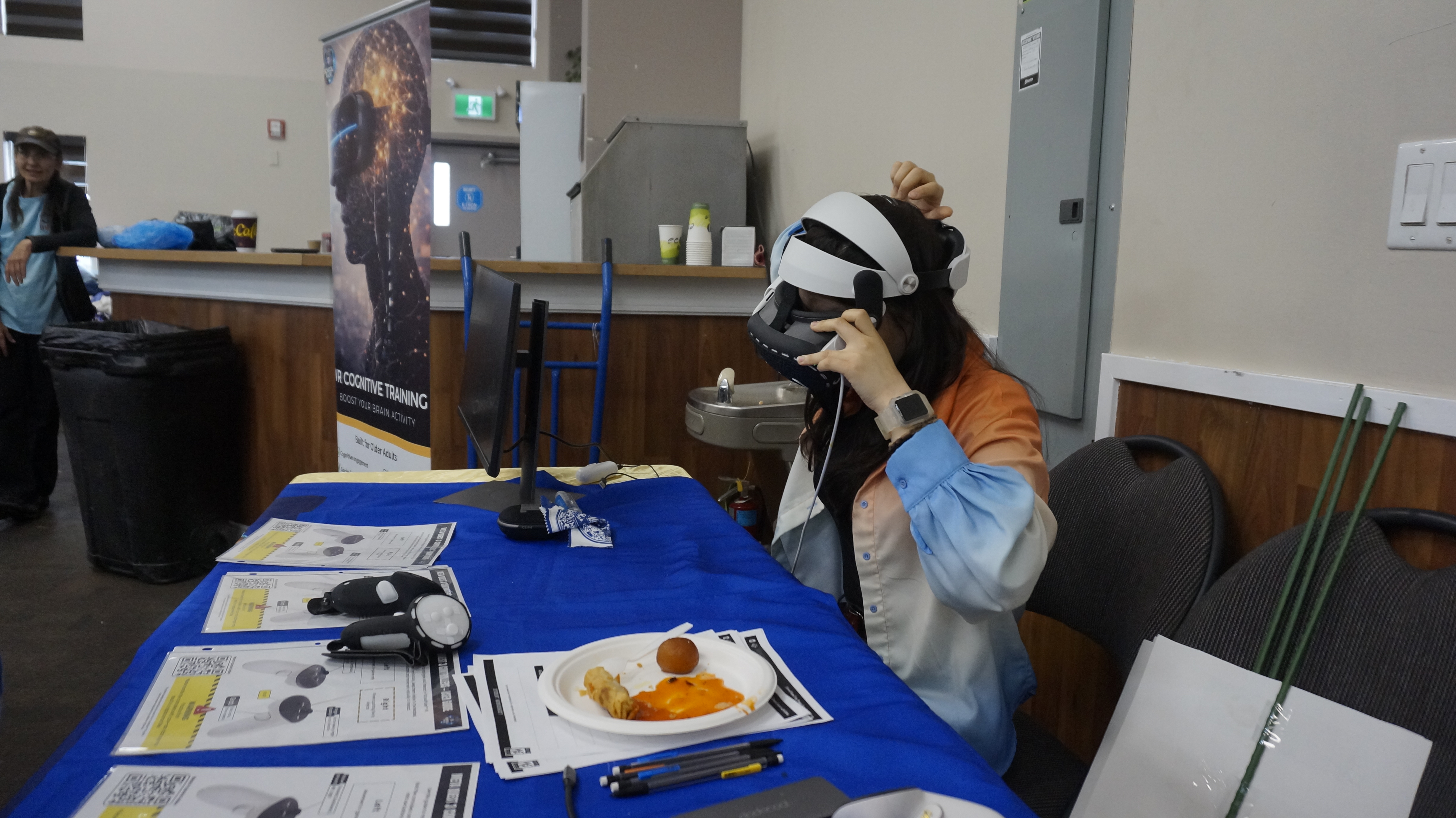 Participants taking part in a seated Immersive Mind & Memory Program (IMMP) activity during a Simple French with Hems workshop