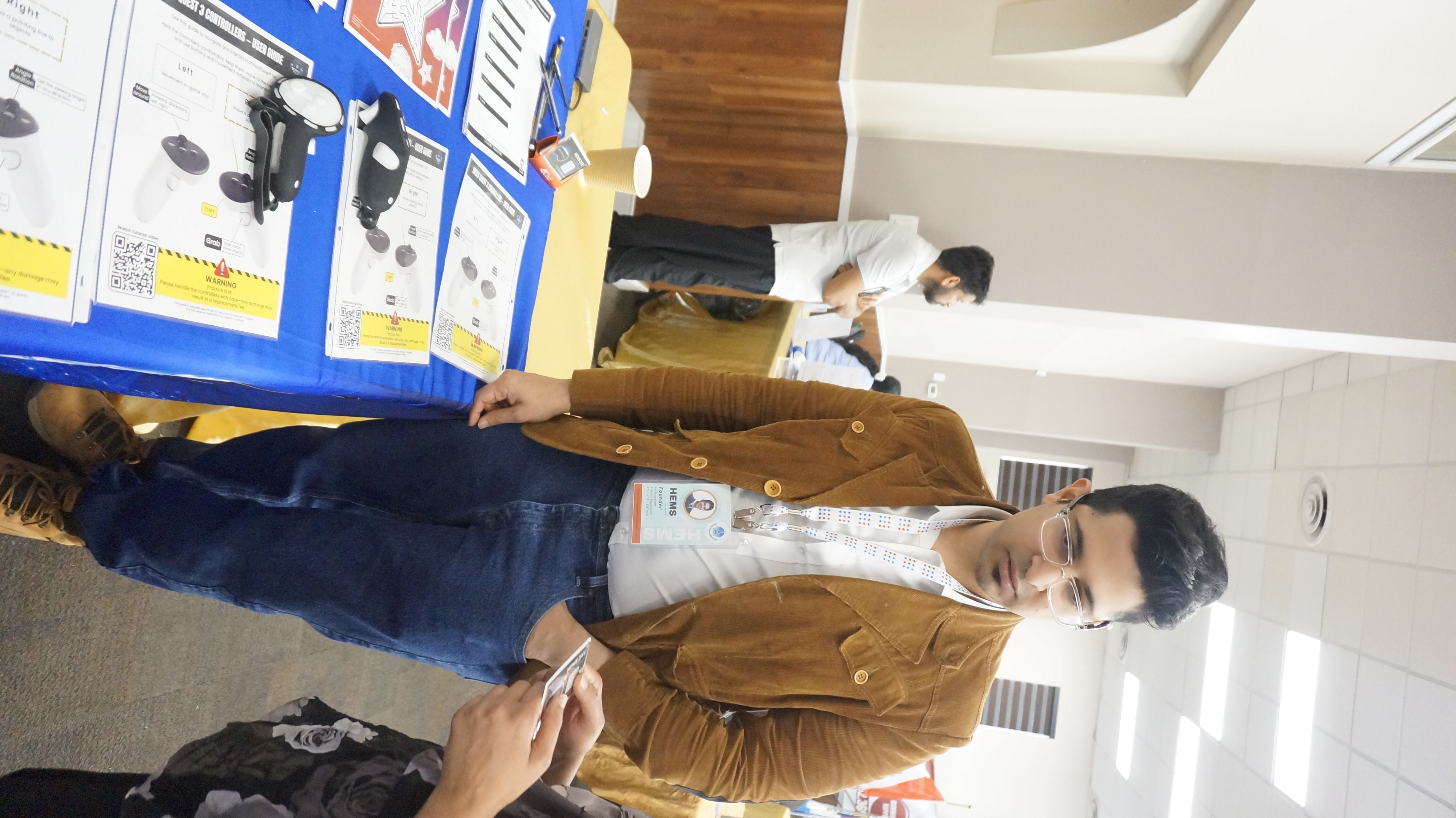 Participant standing while using a VR headset during a guided Immersive Mind & Memory Program (IMMP) pilot session