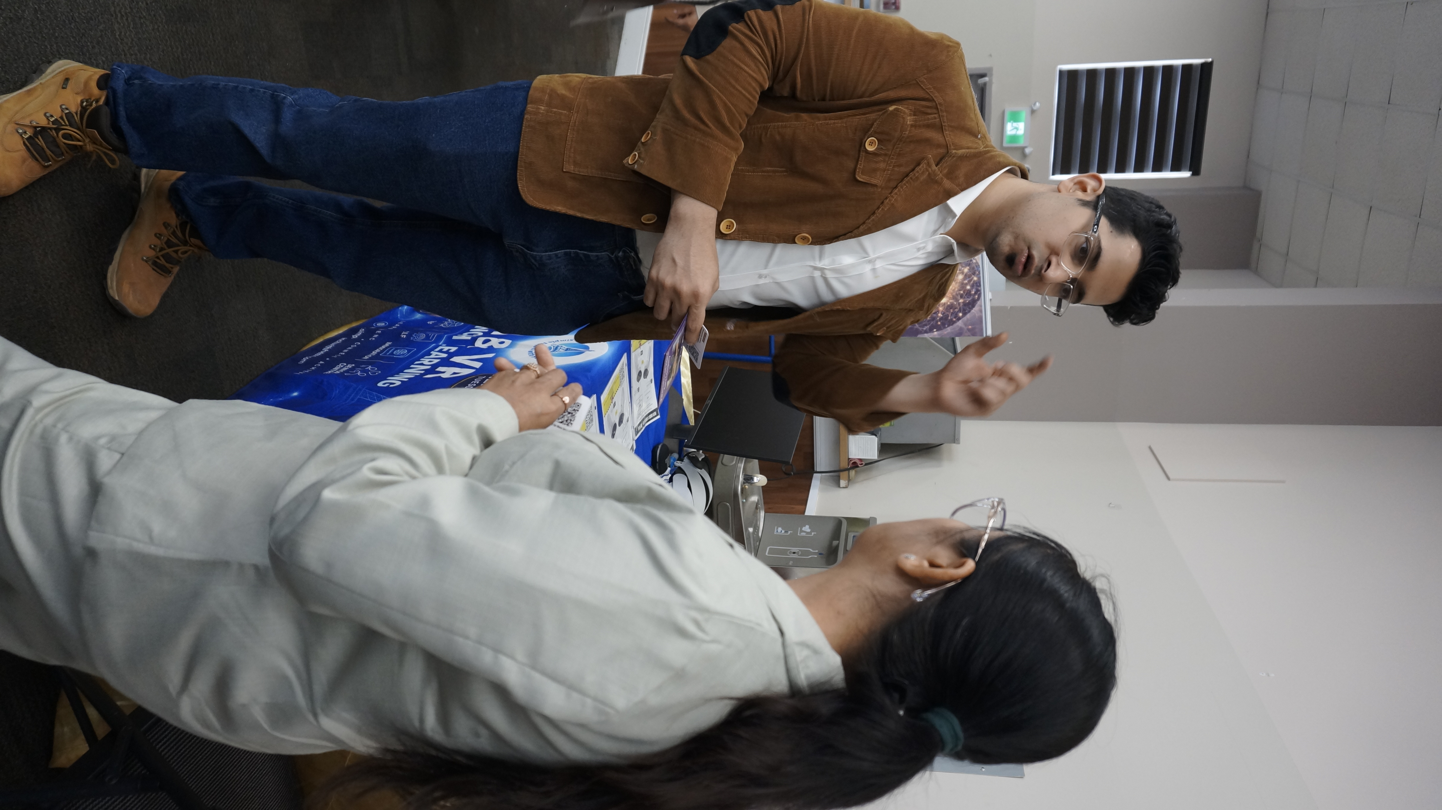 Participant speaking with a Simple French with Hems facilitator during a Immersive Mind & Memory Program (IMMP) pilot activity